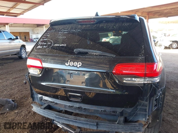 2014 Jeep Grand Cherokee Laredo with VIN 1C4RJEAG3EC472714, listed as a IAAI auction lot 40980100 with 124,603 mi miles. Bid and sale history available at carsss.com. Image 17.