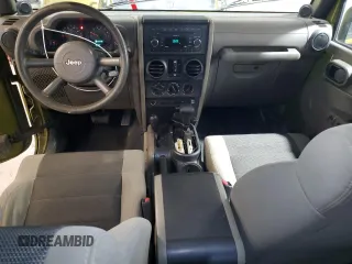 2007 Jeep Wrangler Unlimited X with VIN 1J4GA39187L190061, listed as a Copart auction lot 52420685 with 217,346 mi miles and Salvage Title. Bid and sale history available at DreamBid. Image 8.