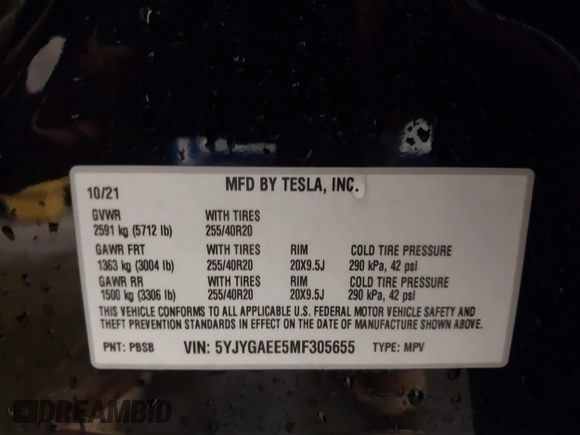 2021 Tesla Model Y Long Range with VIN 5YJYGAEE5MF305655, listed as a IAAI auction lot 41860993 with 50,750 mi miles. Bid and sale history available at carsss.com. Image 9.