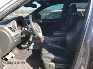 2018 Jeep Grand Cherokee with VIN NJ1454E, listed as a Copart auction lot 48051693 with 66,894 mi miles and Salvage title. Bid and sale history available at DreamBid. Image 7.
