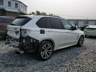 2015 BMW X5 xDrive50i z VIN 5UXKR6C5XF0J77462, wystawiony jako Copart lot #58912895 z przebiegiem 100 086 mil mil oraz Czysty tytuł • Clean title. Historia ofert i sprzedaży dostępna na DreamBid. Obrazek 3.