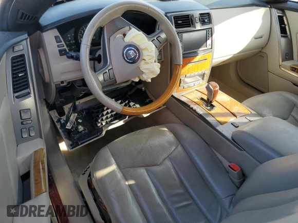 2006 Cadillac XLR z VIN 1G6YV36A765600678, wystawiony jako Copart lot #88111045 z przebiegiem 46 257 mil mil oraz Nie do naprawy • Non repairable. Historia ofert i sprzedaży dostępna na DreamBid. Obrazek 8.
