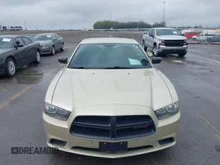 2013 Dodge Charger Police with VIN 2C3CDXAT9DH692946, listed as a IAAI auction lot 42115225 with 107,086 mi miles. Bid and sale history available at carsss.com. Image 6.