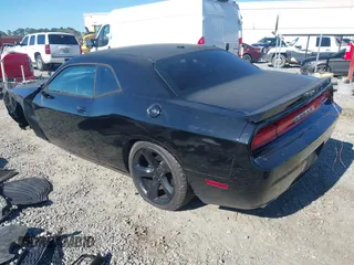 2014 Dodge Challenger R/T Plus z VIN 2C3CDYBT2EH274265, wystawiony jako IAAI lot #41845052 z przebiegiem 120 290 mil mil oraz . Historia ofert i sprzedaży dostępna na DreamBid. Obrazek 3.