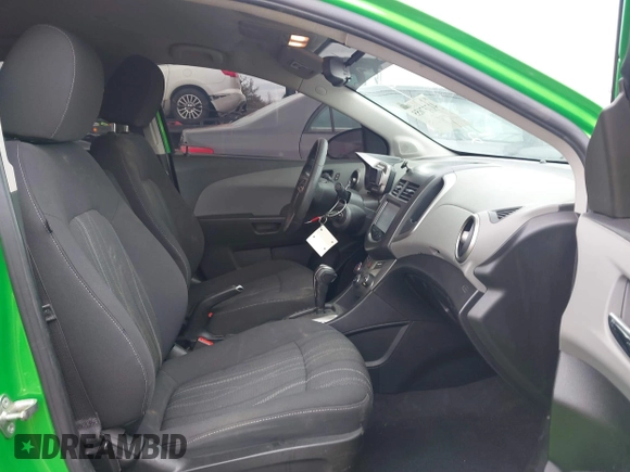 2015 Chevrolet Sonic LT with VIN 1G1JC5SH7F4104412, listed as a IAAI auction lot 41737655 with 124,304 mi miles and . Bid and sale history available at DreamBid. Image 5.
