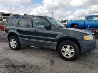 2003 Ford Escape XLT Popular 2 with VIN 1FMCU931X3KB89657, listed as a Copart auction lot 70283764 with 214,990 mi miles and Salvage Title. Bid and sale history available at carsss.com. Image 4.