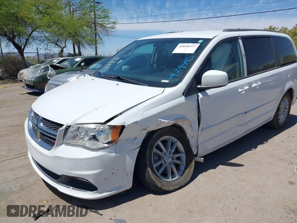 2014 Dodge Grand Caravan SXT with VIN 2C4RDGCG1ER429495, listed as a IAAI auction lot 42058513 with 136,936 mi miles and . Bid and sale history available at DreamBid. Image 17.