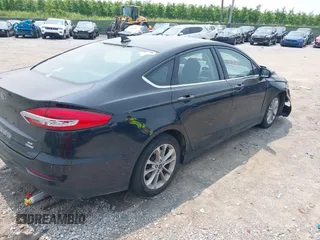 2020 Ford Fusion SE with VIN 3FA6P0LU5LR142665, listed as a IAAI auction lot 42415611 with 101,686 mi miles and . Bid and sale history available at DreamBid. Image 4.