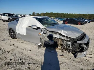 2018 Infiniti Q60 Sport with VIN JN1EV7EL3JM390639, listed as a Copart auction lot 74460834 with 76,707 mi miles and Salvage title. Bid and sale history available at DreamBid. Image 4.