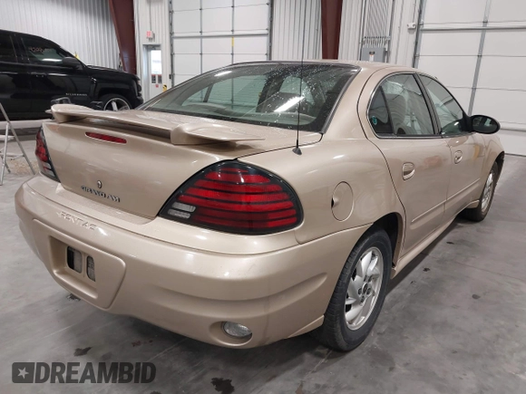 2003 Pontiac Grand Am SE1 with VIN 1G2NF52EX3C104710, listed as a IAAI auction lot 42053621 with 102,012 mi miles. Bid and sale history available at carsss.com. Image 4.