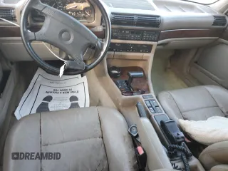 1991 BMW 7 Series z VIN WBAGC4310MDC27706, wystawiony jako Copart lot #81496754 z przebiegiem Nie podano mil oraz Nie do naprawy • Non repairable. Historia ofert i sprzedaży dostępna na DreamBid. Obrazek 8.