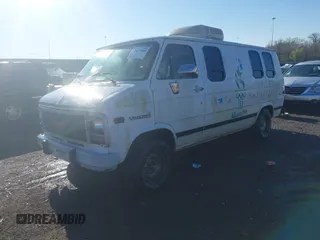 1995 GMC Van z VIN 1GTEG25H8SF548551, wystawiony jako IAAI lot #41830888 z przebiegiem 110 067 mil mil oraz . Historia ofert i sprzedaży dostępna na DreamBid. Obrazek 2.