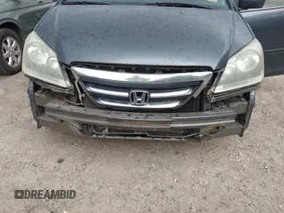 2006 Honda Odyssey EX-L z VIN 5FNRL38756B420817, wystawiony jako IAAI lot #42101271 z przebiegiem 203 892 mil mil oraz . Historia ofert i sprzedaży dostępna na DreamBid. Obrazek 6.