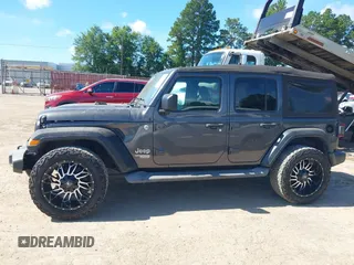 2018 Jeep Wrangler Unlimited Sport S с VIN 1C4HJXDN6JW277829, выставлен на аукционе IAAI как лот 42607187 с пробегом 107 461 миль миль и . История ставок и продаж доступна на DreamBid. Изображение 14.
