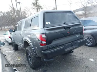 2021 Nissan Titan Pro-4X with VIN 1N6AA1ED0MN504654, listed as a IAAI auction lot 41240824 with 68,533 mi miles and . Bid and sale history available at DreamBid. Image 14.