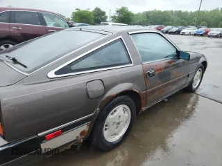 1984 Nissan 300ZX with VIN JN1HZ14S4EX005200, listed as a Copart auction lot 61509385 with 190,583 mi miles and Clean title. Bid and sale history available at DreamBid. Image 10.