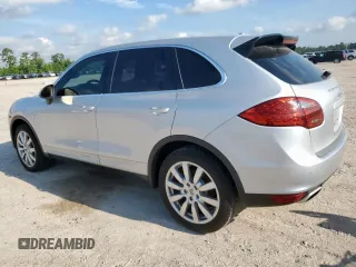 2012 Porsche Cayenne z VIN WP1AA2A22CLA02105, wystawiony jako Copart lot #59392595 z przebiegiem 147 927 mil mil oraz Czysty tytuł • Clean title. Historia ofert i sprzedaży dostępna na DreamBid. Obrazek 2.