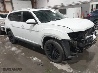 2018 Volkswagen Atlas 3.6L V6 SEL with VIN 1V2MR2CAXJC557973, listed as a IAAI auction lot 41535114 with 107,894 mi miles. Bid and sale history available at carsss.com. Image 1.