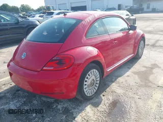2013 Volkswagen Beetle 2.5L w/Sun/Sound/Nav with VIN 3VWJX7AT4DM672158, listed as a IAAI auction lot 42187543 with 94,961 mi miles and . Bid and sale history available at DreamBid. Image 4.
