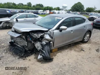 2014 Mazda 3 i Touring with VIN JM1BM1L78E1123302, listed as a Copart auction lot 60421835 with Not provided miles and Salvage title. Bid and sale history available at DreamBid. Image 1.