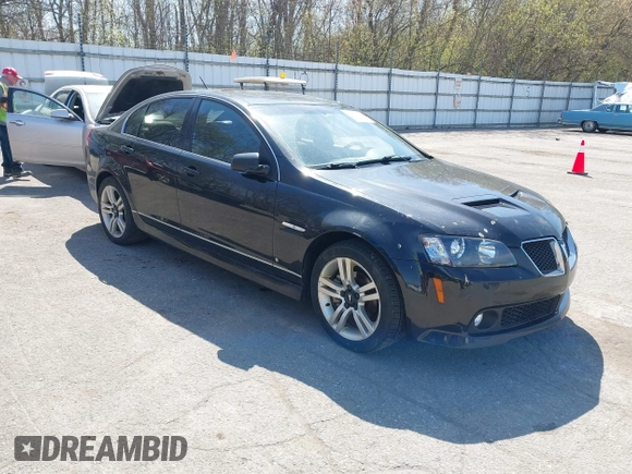 2009 Pontiac G8 with VIN 6G2ER57769L185606, listed as a IAAI auction lot 42112142 with 187,365 mi miles. Bid and sale history available at carsss.com. Image 1.