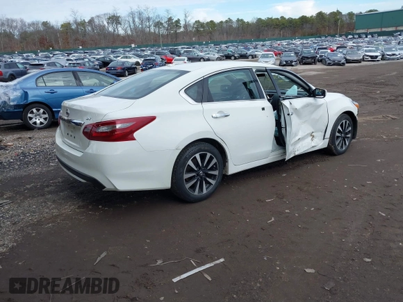 2018 Nissan Altima SR with VIN 1N4AL3APXJC283392, listed as a IAAI auction lot 41214643 with 126,720 mi miles and . Bid and sale history available at DreamBid. Image 4.