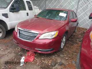 2014 Chrysler 200 LX with VIN 1C3CCBAB7EN214028, listed as a IAAI auction lot 42225534 with 140,106 mi miles and . Bid and sale history available at DreamBid. Image 2.