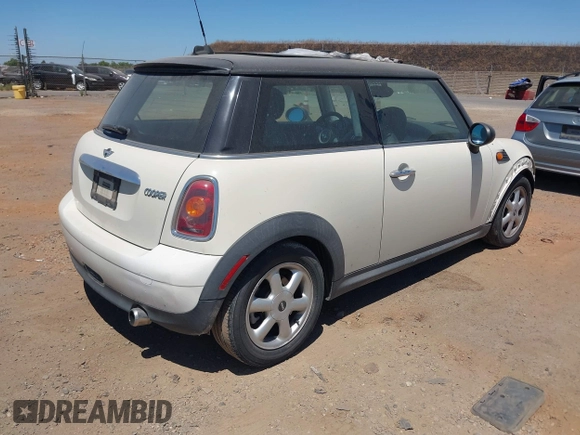 2010 MINI Hardtop with VIN WMWMF3C51ATZ23464, listed as a IAAI auction lot 42710259 with 124,660 mi miles and . Bid and sale history available at DreamBid. Image 4.