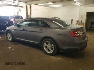 2014 Ford Taurus SEL z VIN 1FAHP2E85EG146469, wystawiony jako Copart lot #59506195 z przebiegiem 158 124 mil mil oraz Szkoda całkowita • Salvage title. Historia ofert i sprzedaży dostępna na DreamBid. Obrazek 2.