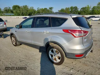 2013 Ford Escape SE z VIN 1FMCU9G92DUD07397, wystawiony jako Copart lot #63110315 z przebiegiem 167 296 mil mil oraz Czysty tytuł • Clean title. Historia ofert i sprzedaży dostępna na DreamBid. Obrazek 2.