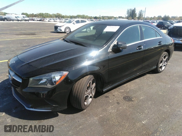 2018 Mercedes-Benz CLA with VIN WDDSJ4EBXJN650357, listed as a IAAI auction lot 35930612 with 75,371 mi miles. Bid and sale history available at carsss.com. Image 2.