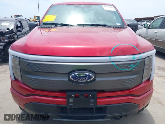 2023 Ford F-150 Lightning Pro with VIN 1FTVW1EL8PWG33656, listed as a IAAI auction lot 42260659 with 22,490 mi miles and . Bid and sale history available at DreamBid. Image 12.