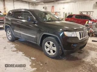 2012 Jeep Grand Cherokee Laredo with VIN 1C4RJFAT1CC225479, listed as a IAAI auction lot 41709911 with 227,150 mi miles. Bid and sale history available at carsss.com. Image 1.