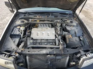 1999 Cadillac DeVille z VIN 1G6KD54Y5XU767438, wystawiony jako Copart lot #86133764 z przebiegiem Nie podano mil oraz Nie do naprawy • Non repairable. Historia ofert i sprzedaży dostępna na DreamBid. Obrazek 13.