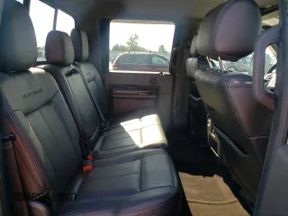 2015 Ford F-350 Platinum z VIN 1FT8W3BTXFEA30693, wystawiony jako Copart lot #61465335 z przebiegiem 296 574 mil mil oraz Szkoda całkowita • Salvage title. Historia ofert i sprzedaży dostępna na DreamBid. Obrazek 10.