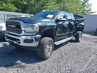 2022 Ram 2500 Limited with VIN 3C6UR5TLXNG377875, listed as a IAAI auction lot 42610178 with 46,390 mi miles and . Bid and sale history available at DreamBid. Image 2.