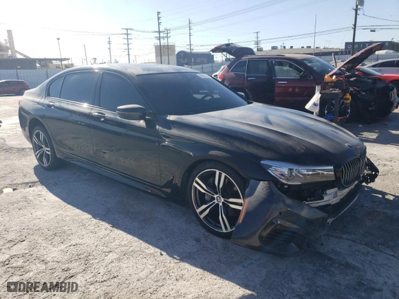 2019 BMW 7 Series 740i with VIN WBA7E2C59KB216498, listed as a Copart auction lot 86039154 with 87395 miles and Salvage Title. Bid and sale history available at carsss.com. Image 4.