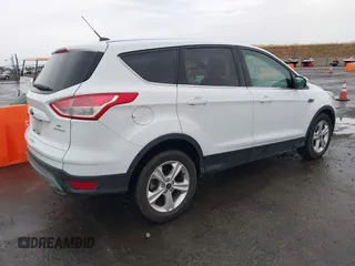 2015 Ford Escape SE with VIN 1FMCU0GXXFUB96076, listed as a IAAI auction lot 40914596 with 134,066 mi miles. Bid and sale history available at carsss.com. Image 4.
