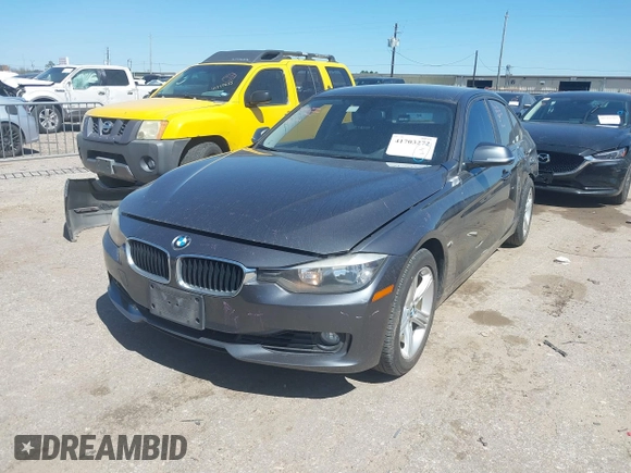 2012 BMW 3 Series 328i with VIN WBA3A5C53CFJ89806, listed as a IAAI auction lot 41703272 with 111,238 mi miles. Bid and sale history available at carsss.com. Image 2.