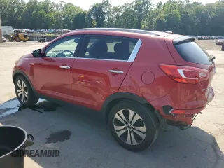 2011 Kia Sportage EX with VIN KNDPCCA27B7079569, listed as a Copart auction lot 62072015 with 156,569 mi miles and Salvage title. Bid and sale history available at DreamBid. Image 2.