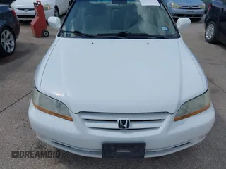 2002 Honda Accord LX z VIN 1HGCG56482A067556, wystawiony jako IAAI lot #42494292 z przebiegiem 209 511 mil mil oraz . Historia ofert i sprzedaży dostępna na DreamBid. Obrazek 6.