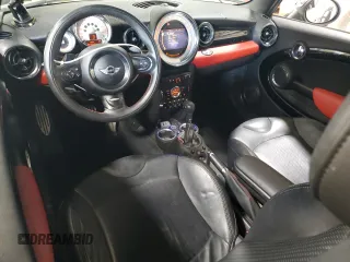 2013 MINI Convertible S z VIN WMWZP3C50DT550943, wystawiony jako Copart lot #62070255 z przebiegiem 63 122 mil mil oraz Szkoda całkowita • Salvage title. Historia ofert i sprzedaży dostępna na DreamBid. Obrazek 8.