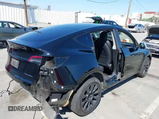 2022 Tesla Model Y Long Range with VIN 7SAYGDEE6NF480471, listed as a IAAI auction lot 41985797 with 82,777 mi miles and . Bid and sale history available at DreamBid. Image 4.