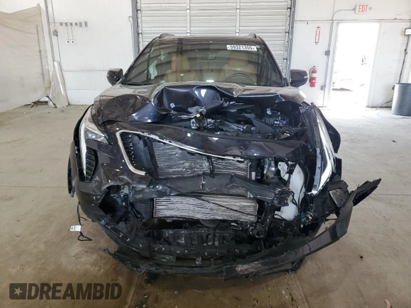 2023 Cadillac XT4 AWD Sport z VIN 1GYFZFR41PF103650, wystawiony jako Copart lot #59321355 z przebiegiem 27 092 mil mil oraz Szkoda całkowita • Salvage title. Historia ofert i sprzedaży dostępna na DreamBid. Obrazek 5.