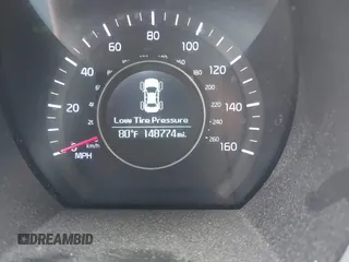 2014 Kia Optima LX with VIN 5XXGM4A7XEG334175, listed as a IAAI auction lot 42169281 with 148,774 mi miles. Bid and sale history available at carsss.com. Image 7.