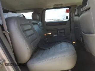 2003 Hummer H2 z VIN 5GRGN23U33H142552, wystawiony jako Copart lot #61152055 z przebiegiem Nie podano mil oraz Czysty tytuł • Clean title. Historia ofert i sprzedaży dostępna na DreamBid. Obrazek 11.
