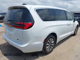 2023 Chrysler Pacifica Hybrid Touring L z VIN 2C4RC1L76PR618422, wystawiony jako IAAI lot #42289283 z przebiegiem 40 744 mil mil oraz . Historia ofert i sprzedaży dostępna na DreamBid. Obrazek 4.