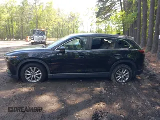 2016 Mazda CX-9 Sport with VIN JM3TCABY8G0112981, listed as a IAAI auction lot 42093389 with 106,384 mi miles. Bid and sale history available at carsss.com. Image 14.
