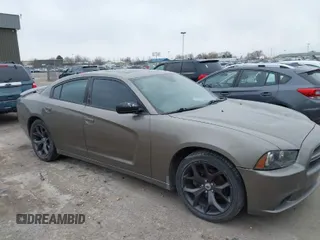 2011 Dodge Charger Rallye with VIN 2B3CL3CG6BH520184, listed as a IAAI auction lot 41767834 with 158,757 mi miles. Bid and sale history available at carsss.com. Image 1.