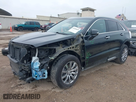 2023 Cadillac XT4 FWD Premium Luxury with VIN 1GYFZCR48PF142752, listed as a IAAI auction lot 42183025 with 45,536 mi miles and . Bid and sale history available at DreamBid. Image 2.
